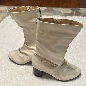 Women’s mid-calf zip up boots